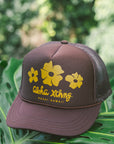 Puakenikeni Youth Trucker Hat